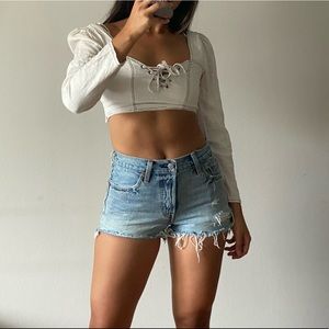 Levi’s Raw Hem Mid-rise Shorts, Size 0